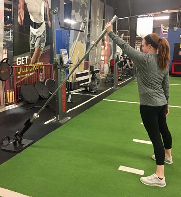 Woman doing bar exercises