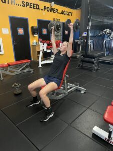 Girl doing shoulder press