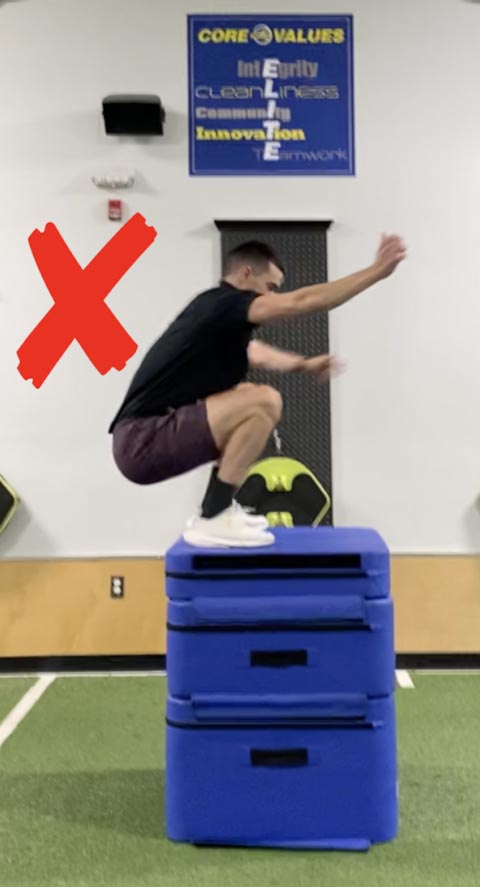 image showing incorrect posture for doing box jump