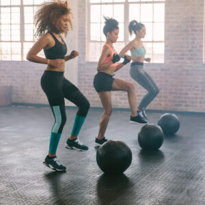 people exercising with medicine balls