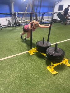 Morgan Macdonald sled push