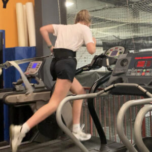 lady running on treadmill